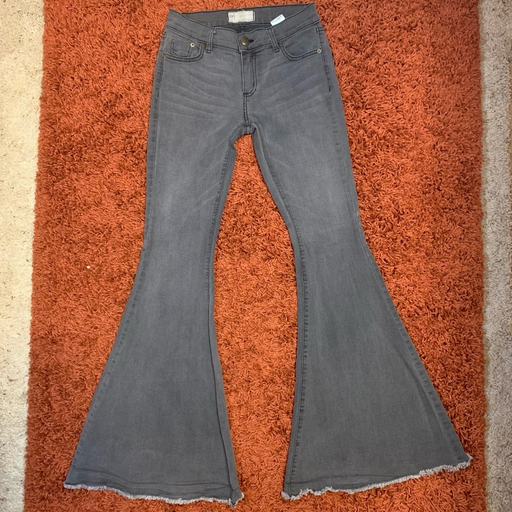 Free People black super flare washed black jeans